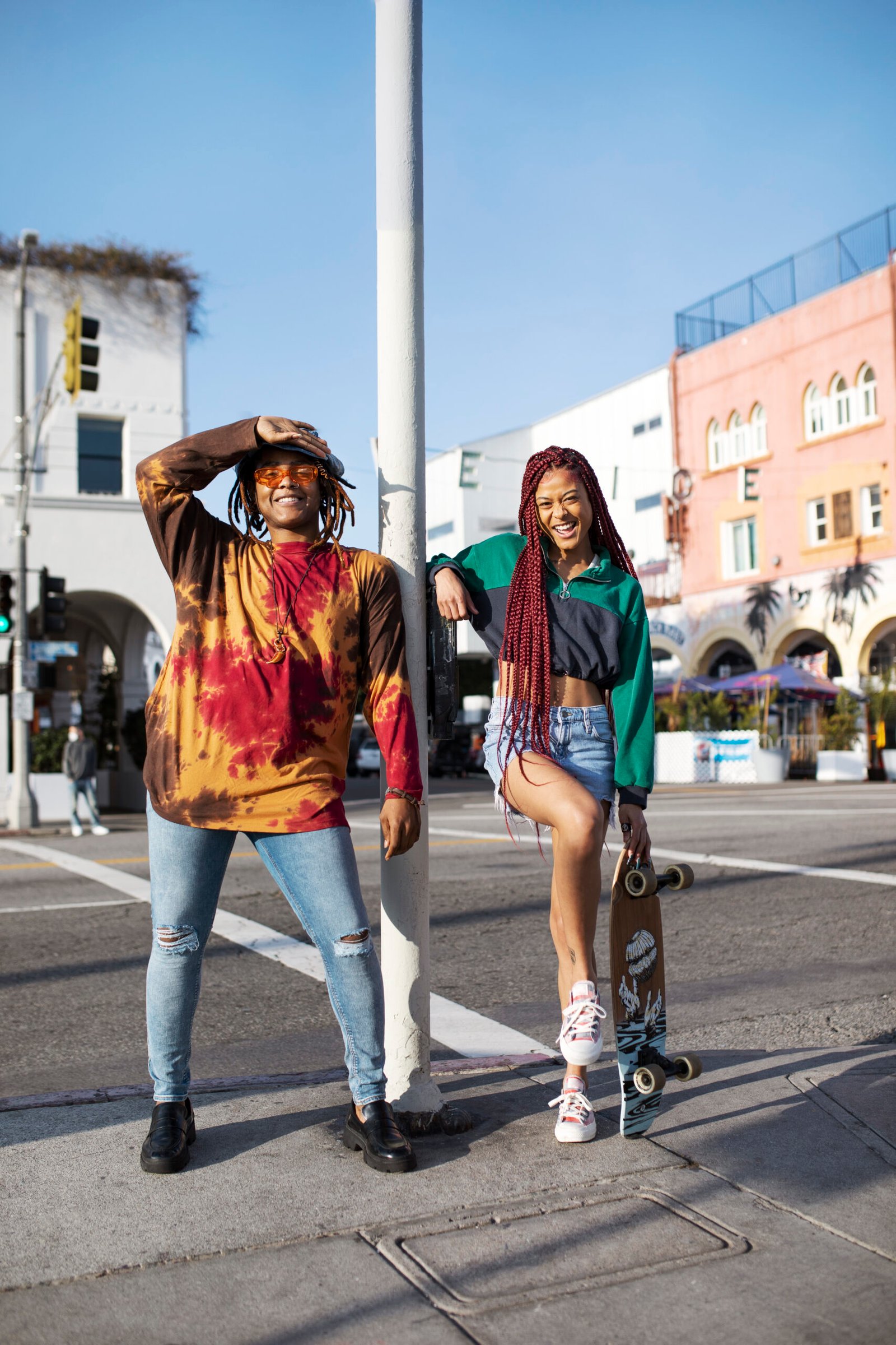 young-man-posing-with-his-friend-with-skateboard-city - Copy - Copy